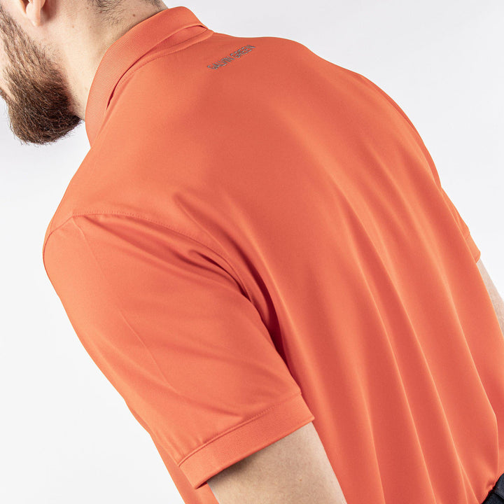 Max Tour is a Breathable short sleeve golf shirt for Men in the color Orange(6)