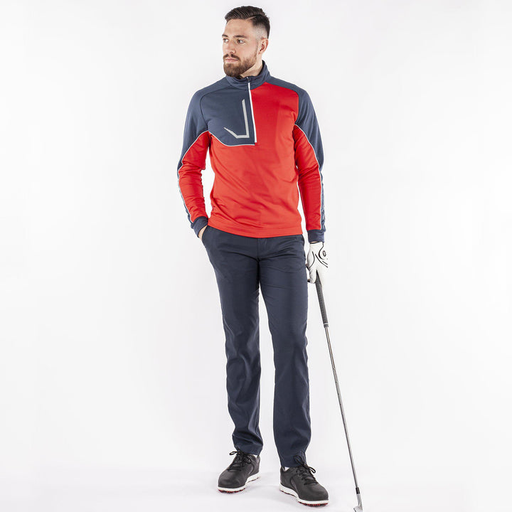 Daxton is a Insulating golf mid layer for Men in the color Sporty Red(3)