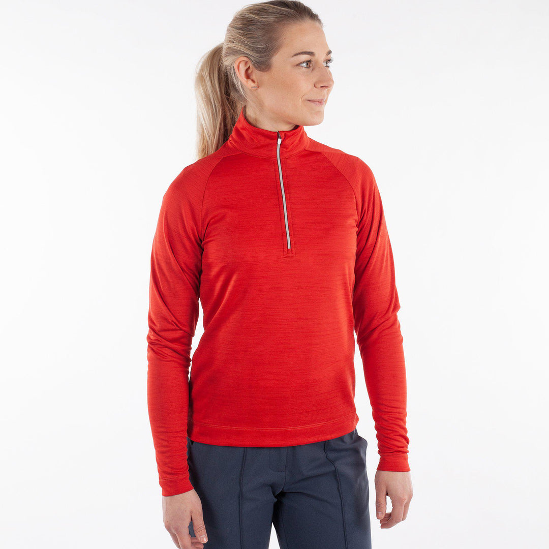 Dina is a Insulating golf mid layer for Women in the color Red(1)