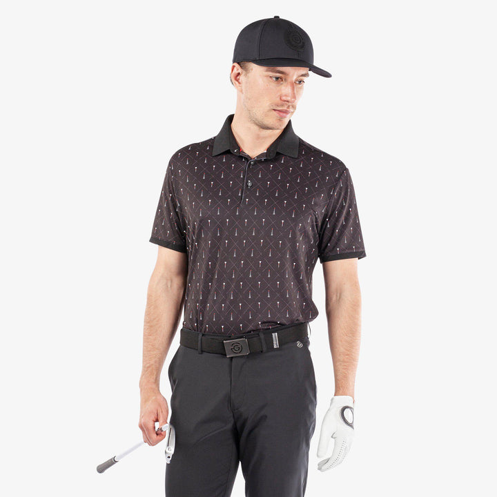 Manolo is a Breathable short sleeve golf shirt for Men in the color Black/White/Red(1)