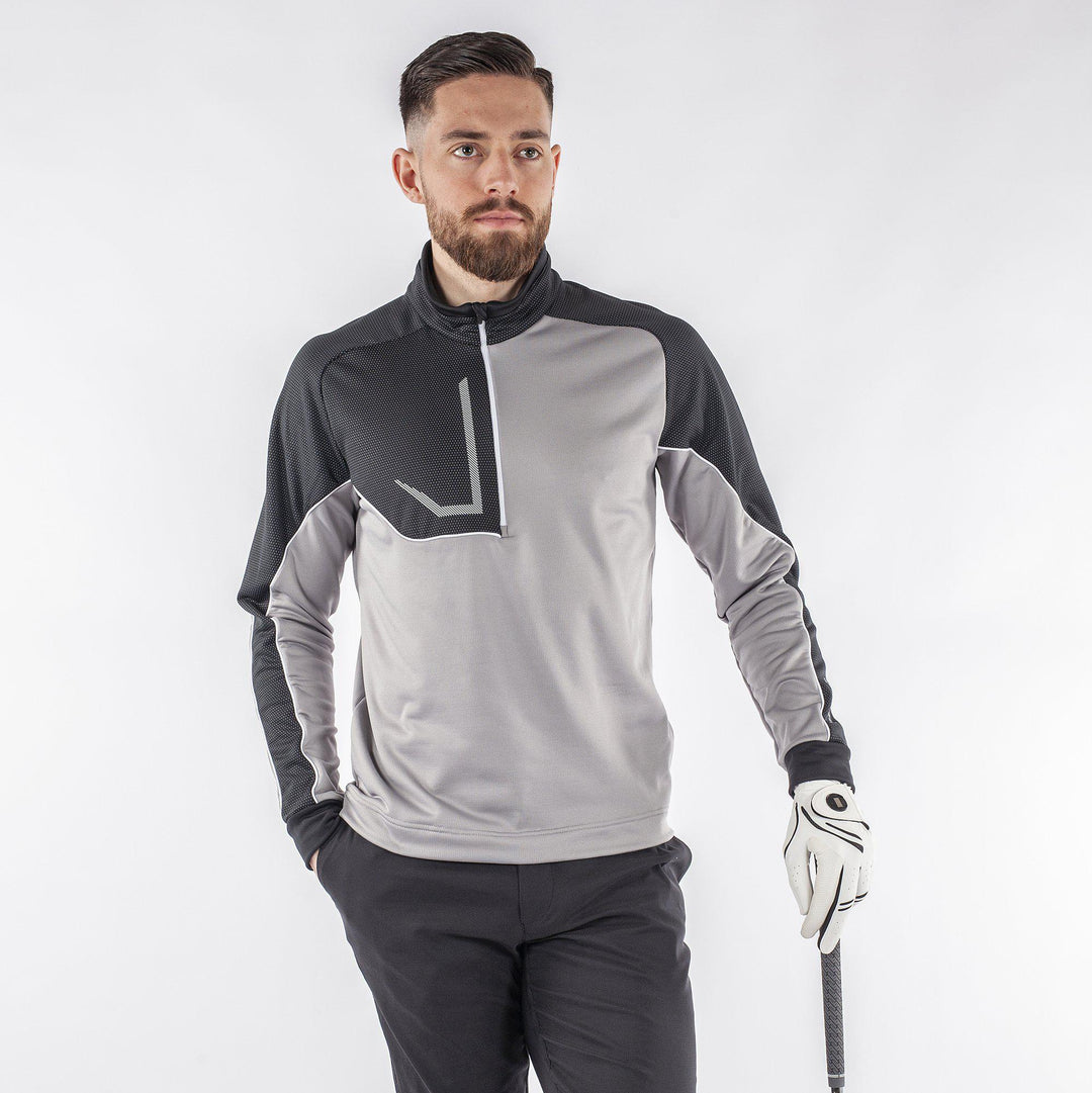Daxton is a Insulating golf mid layer for Men in the color Fantastic Black(1)