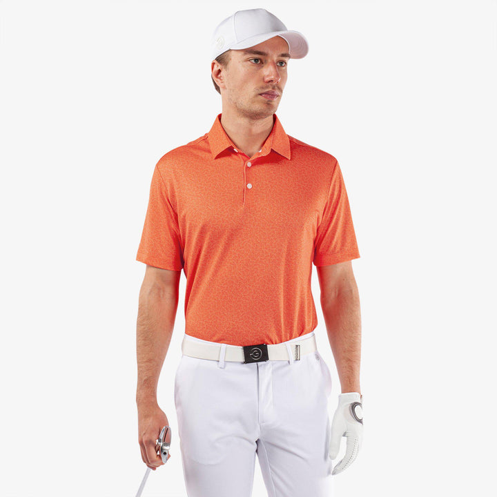 Mani is a Breathable short sleeve golf shirt for Men in the color Orange(1)