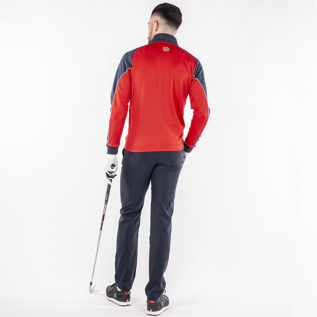 Daxton is a Insulating golf mid layer for Men in the color Sporty Red(9)