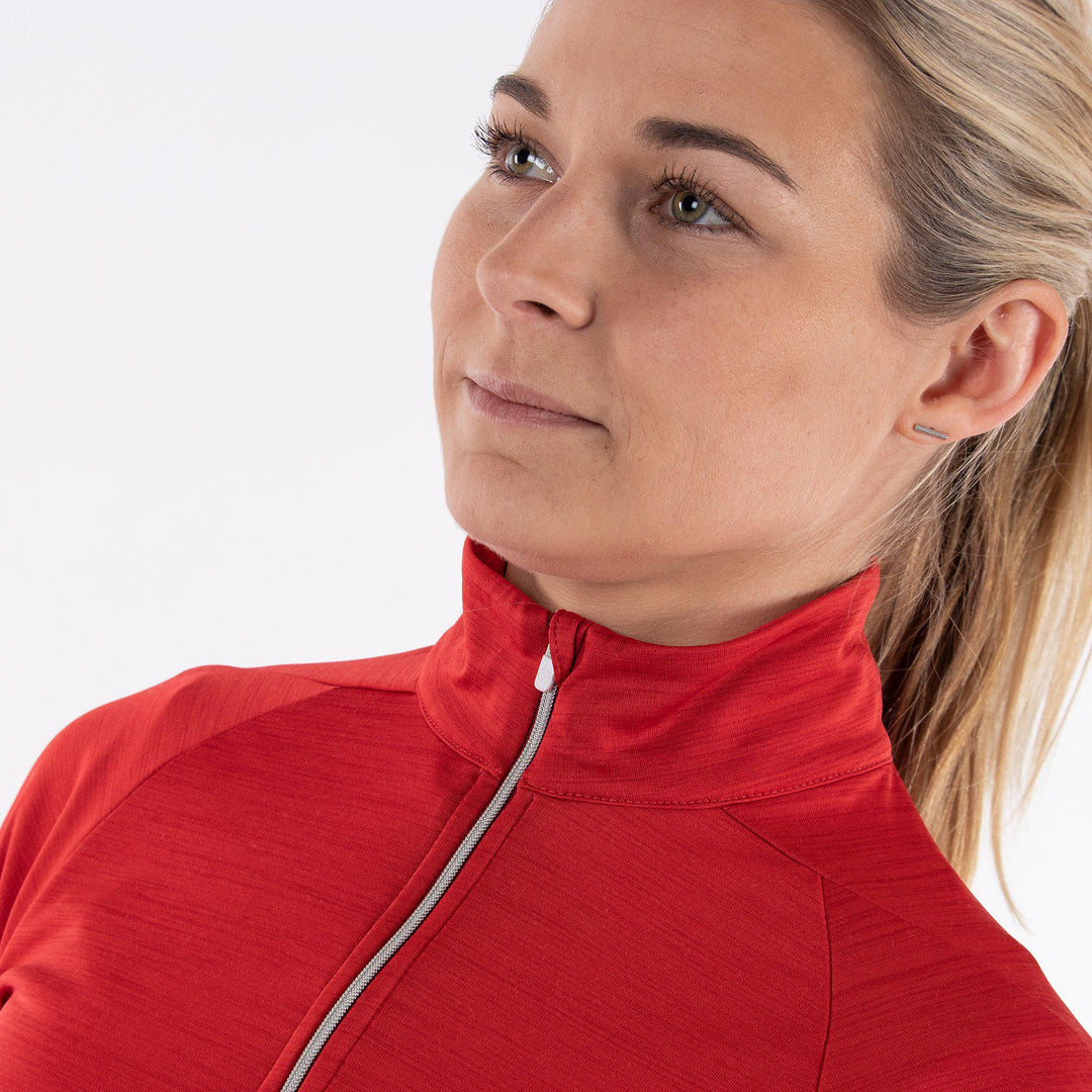 Dina is a Insulating golf mid layer for Women in the color Red(2)