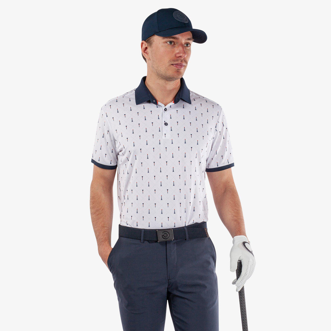 Manolo is a Breathable short sleeve golf shirt for Men in the color White/Navy/Orange(1)