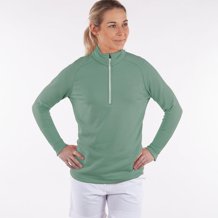 Dolly Upcycled is a Insulating mid layer for Women in the color Golf Green(1)