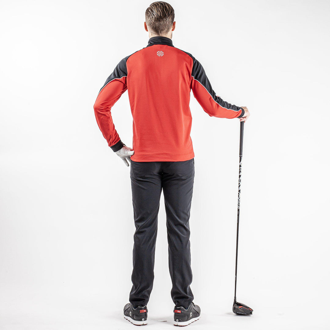 Daxton is a Insulating golf mid layer for Men in the color Red(8)