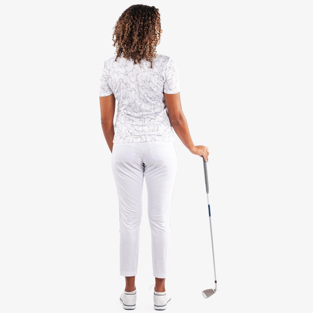 Mallory is a Breathable short sleeve golf shirt for Women in the color White/Cool Grey(6)