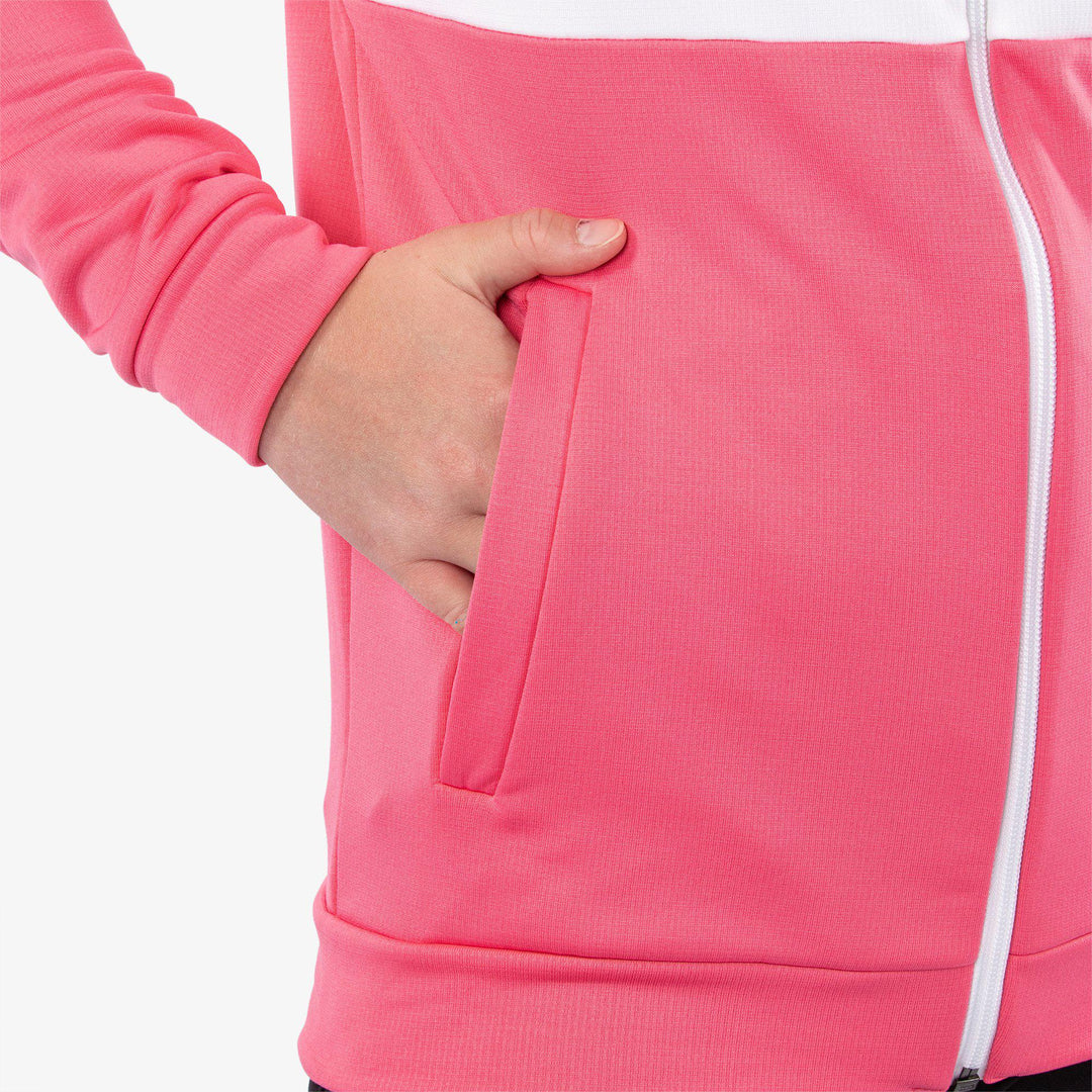 Rex is a Insulating golf mid layer for Juniors in the color Camelia Rose/White(5)
