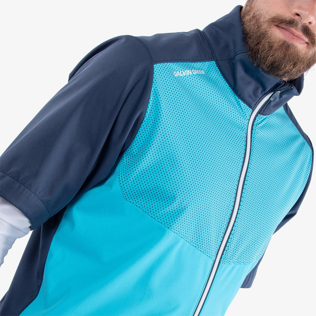 Livingston is a Windproof and water repellent golf jacket for Men in the color Aqua/Navy(3)