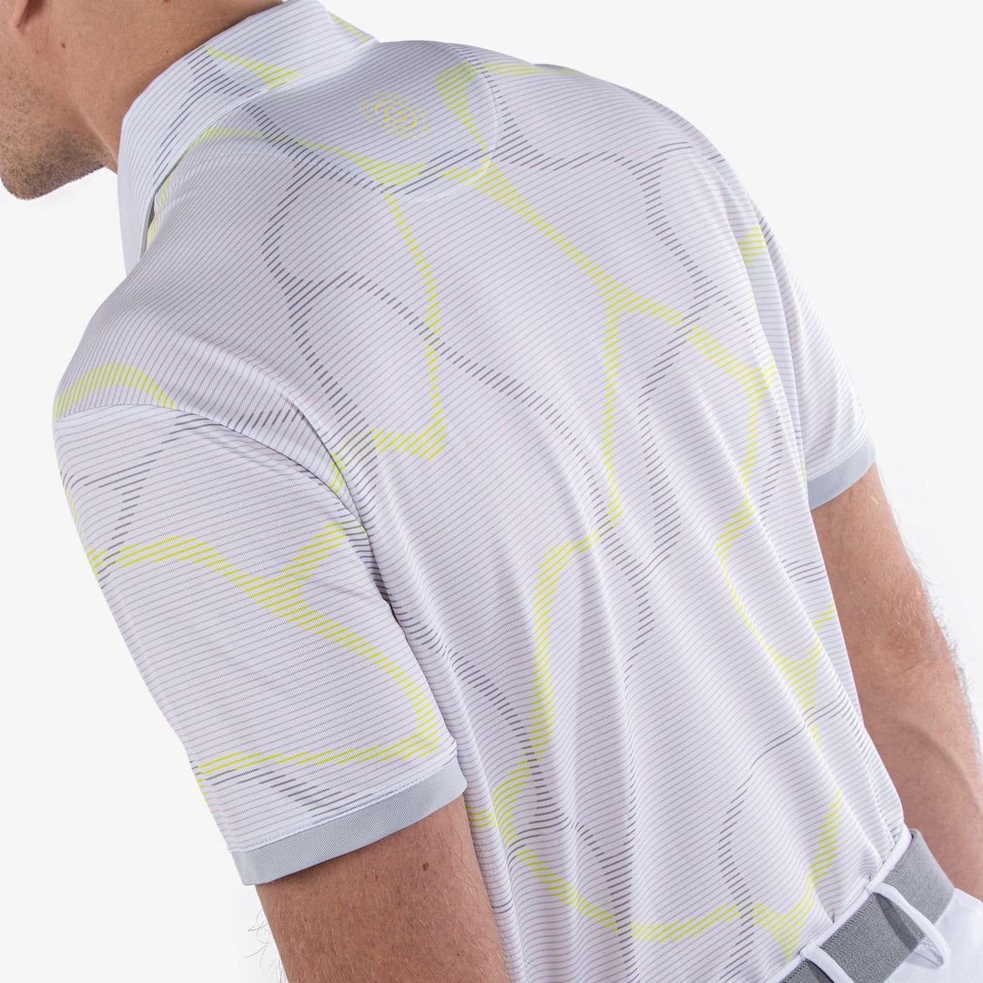 Markos is a Breathable short sleeve golf shirt for Men in the color White/Sunny Lime(6)