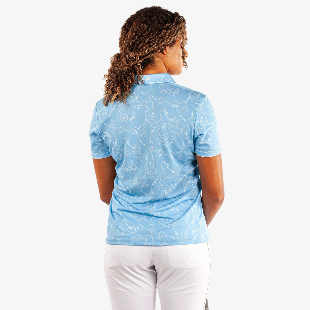 Mallory is a Breathable short sleeve golf shirt for Women in the color Alaskan Blue/White(4)