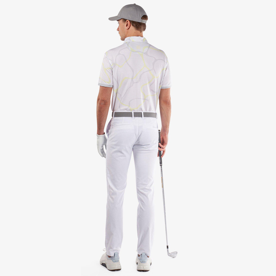 Markos is a Breathable short sleeve golf shirt for Men in the color White/Sunny Lime(7)