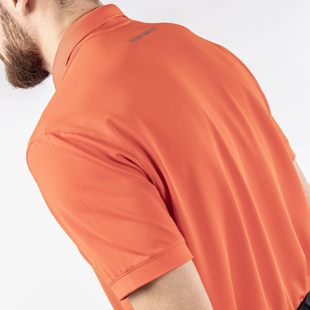 Max Tour is a Breathable short sleeve golf shirt for Men in the color Orange(6)
