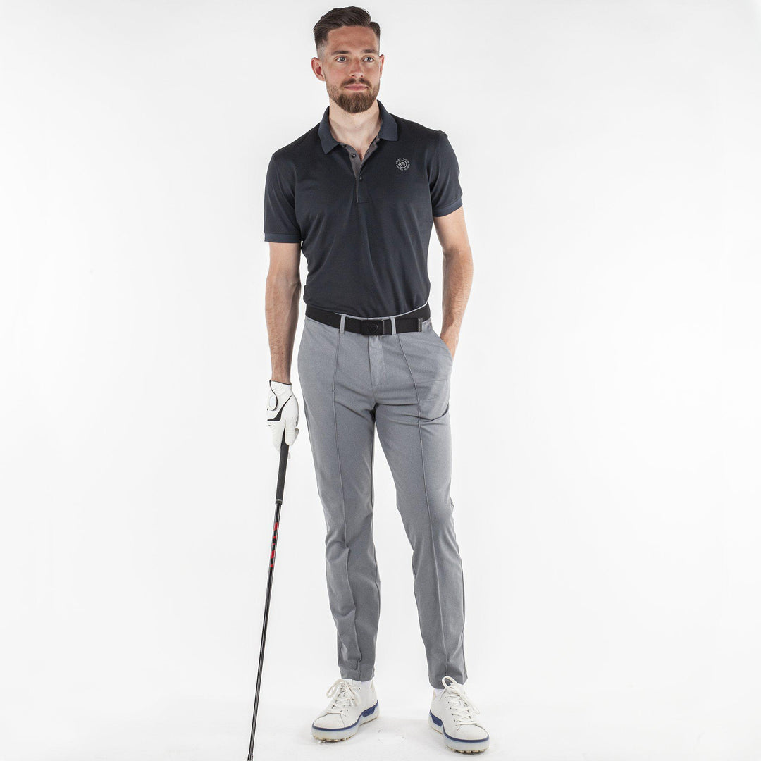 Max Tour is a Breathable short sleeve golf shirt for Men in the color Black(2)
