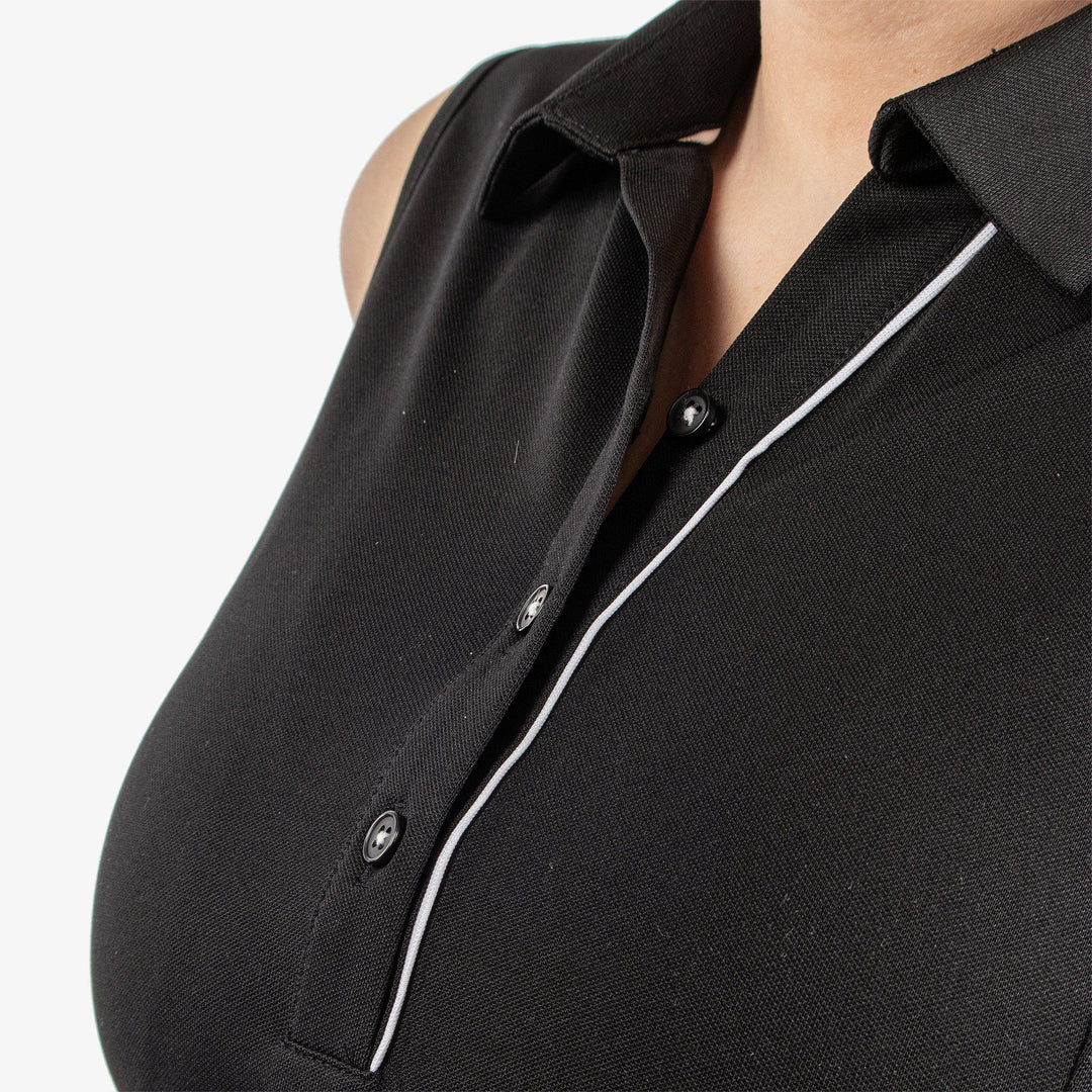 Meg is a Breathable short sleeve golf shirt for Women in the color Black/White(5)