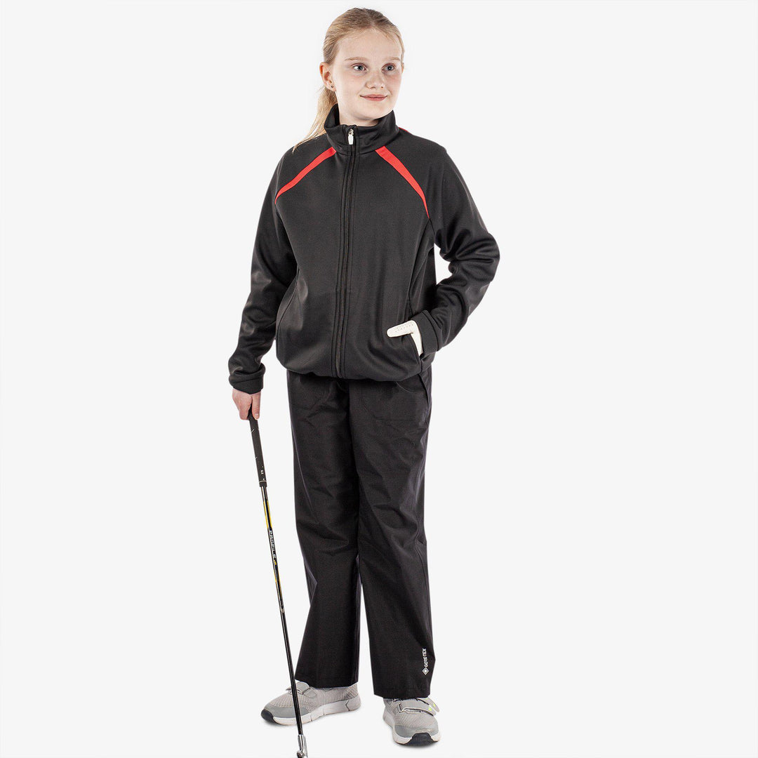Reine is a Windproof and water repellent golf jacket for Juniors in the color Black(2)