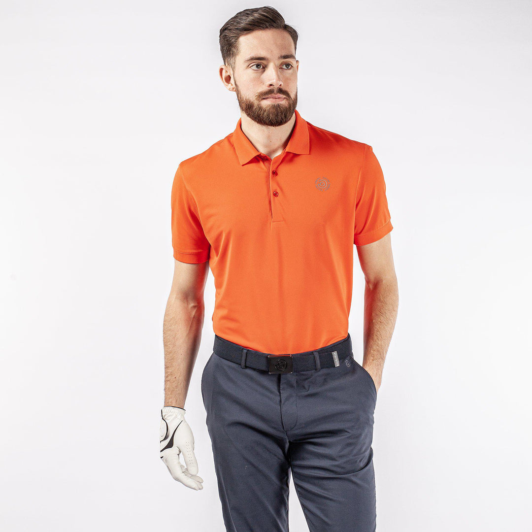 Max Tour is a Breathable short sleeve golf shirt for Men in the color Orange(1)
