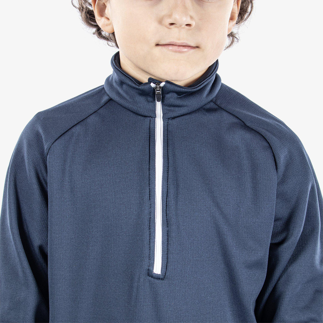 Raz is a Insulating golf mid layer for Juniors in the color Navy(3)