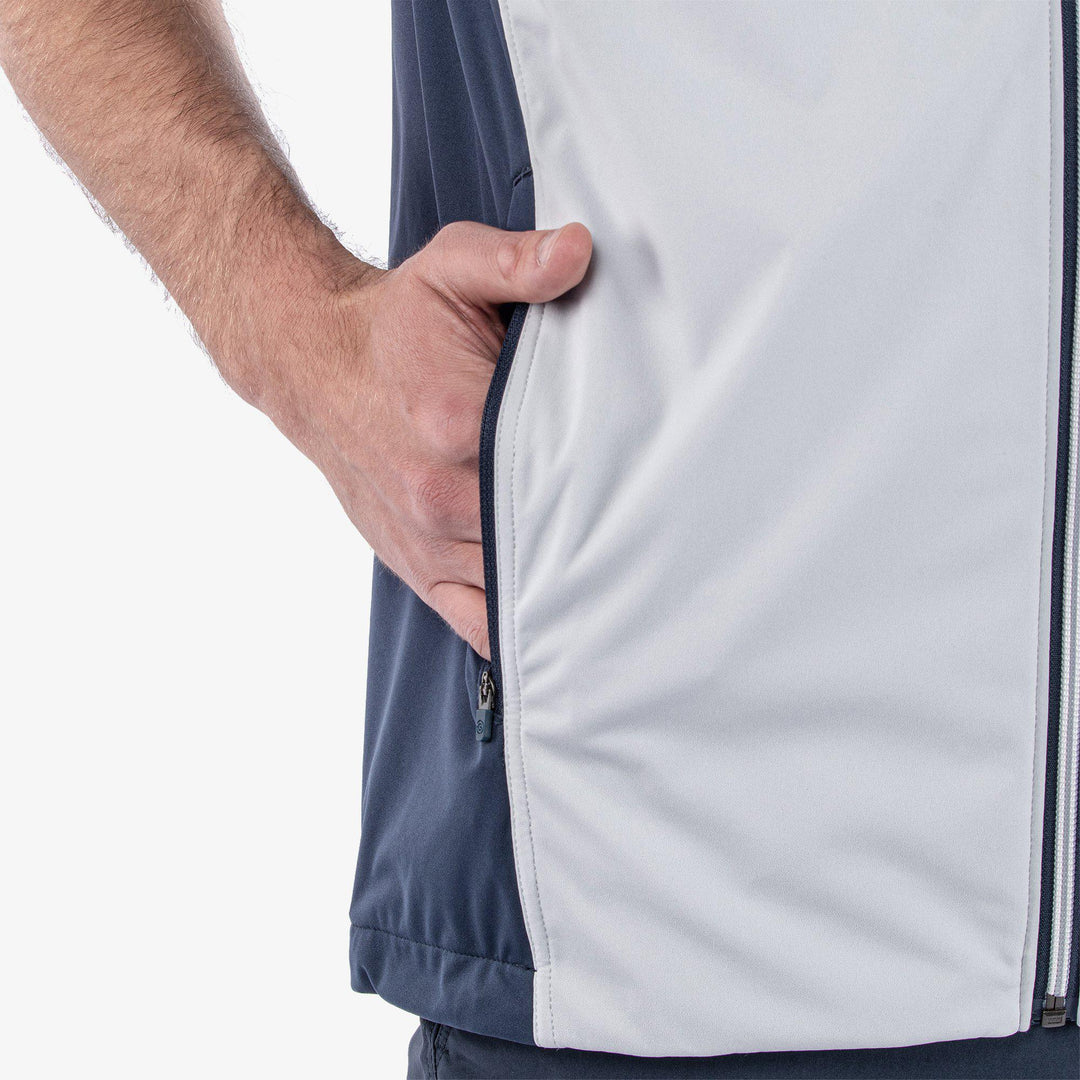 Lathan is a Windproof and water repellent golf vest for Men in the color Cool Grey/Navy(5)