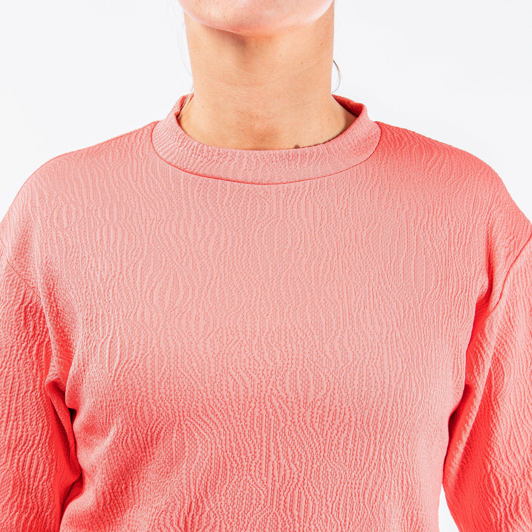 Dalia is a Insulating mid layer for Women in the color Sugar Coral(3)