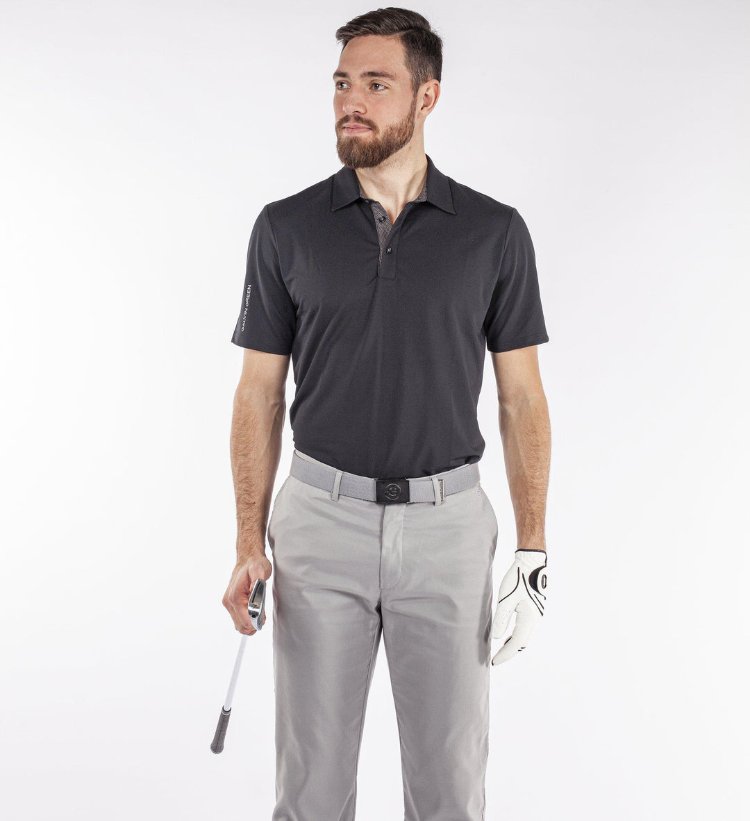 Milan is a Breathable short sleeve golf shirt for Men in the color Black(1)