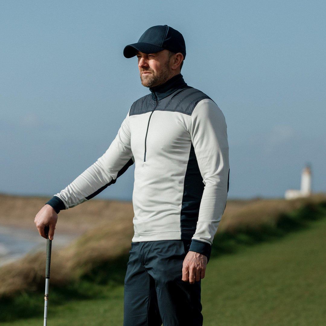 Durante is a Insulating golf mid layer for Men in the color Cool Grey/Navy(9)