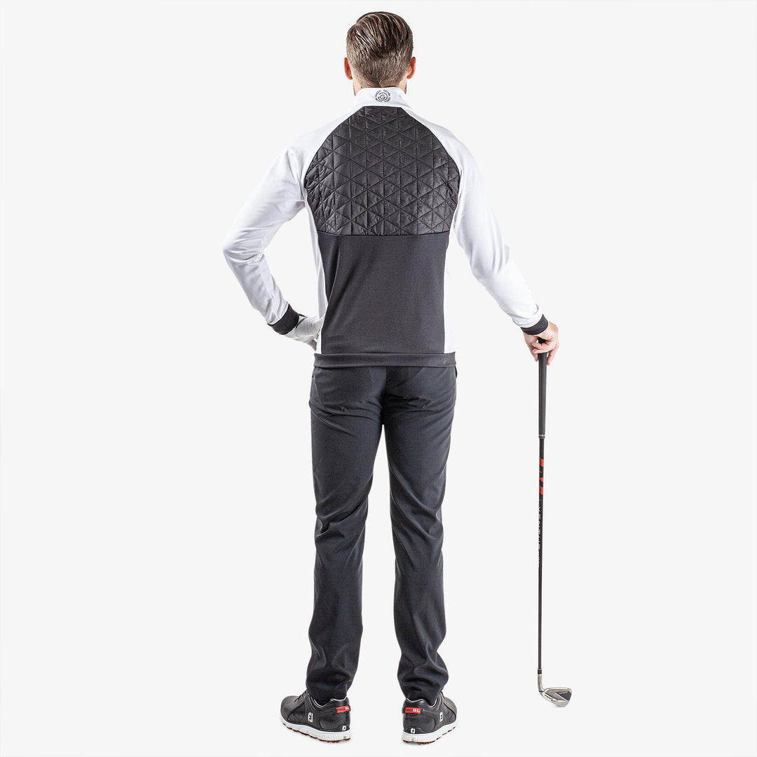 Dexter is a Insulating golf mid layer for Men in the color Black/White(8)