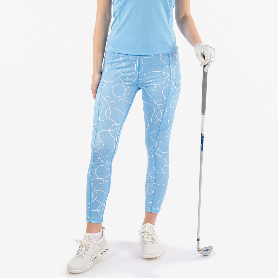 Nicoline is a Breathable and stretchy golf leggings for Women in the color Alaskan Blue/White(1)