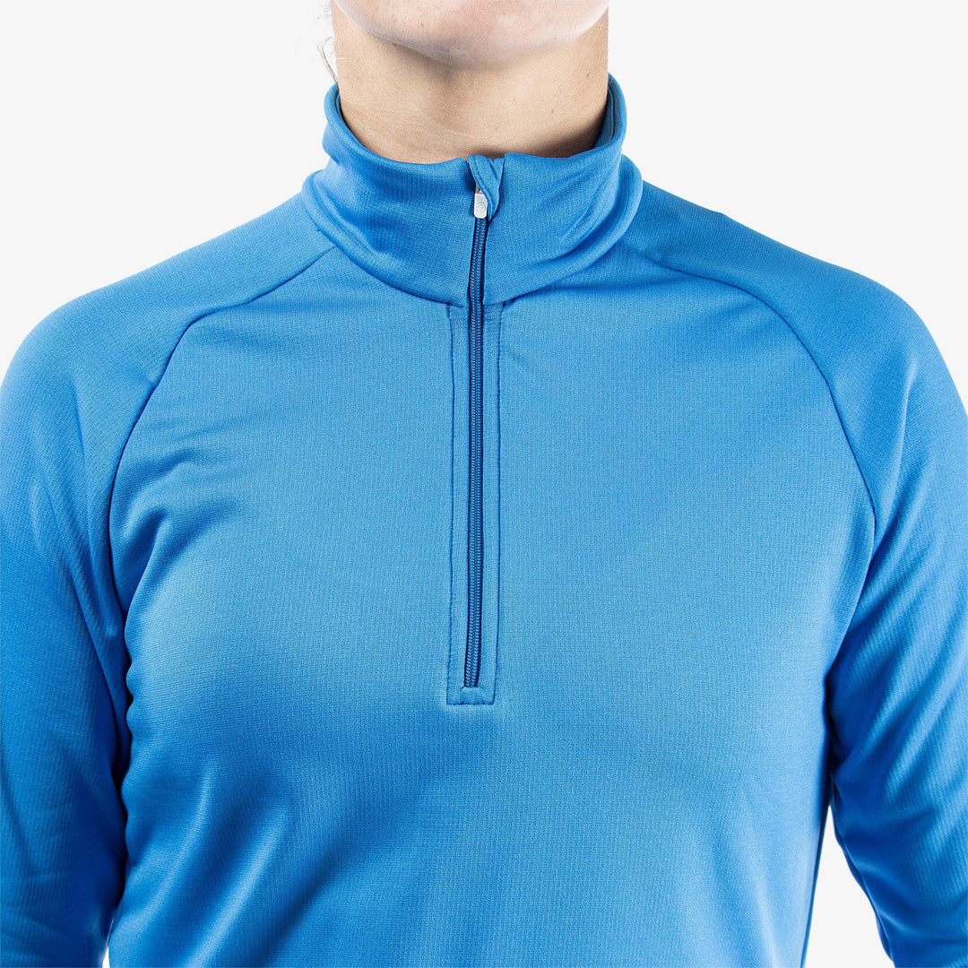 Dolly is a Insulating golf mid layer for Women in the color Blue(4)
