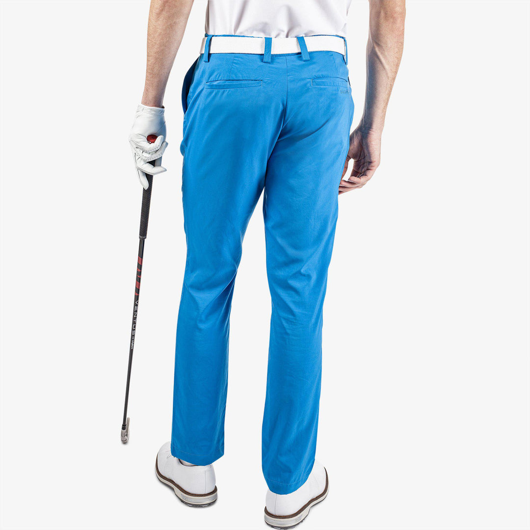 Nixon is a Breathable golf pants for Men in the color Blue(4)