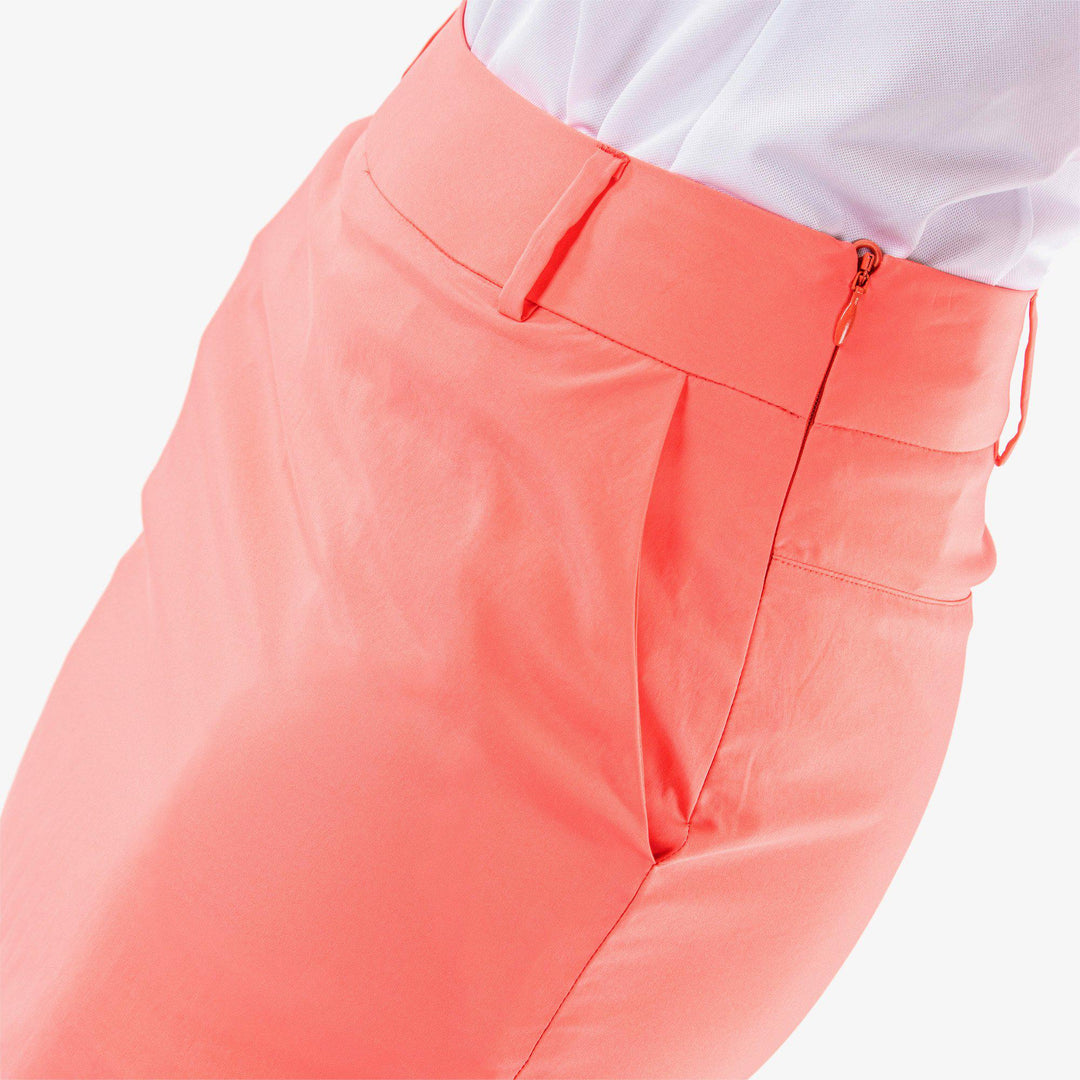 Nessa is a Breathable golf skirt with inner shorts for Women in the color Coral(3)