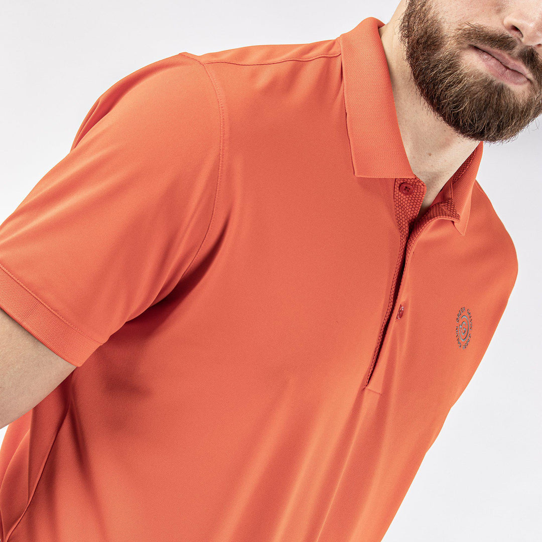 Max Tour is a Breathable short sleeve golf shirt for Men in the color Orange(3)