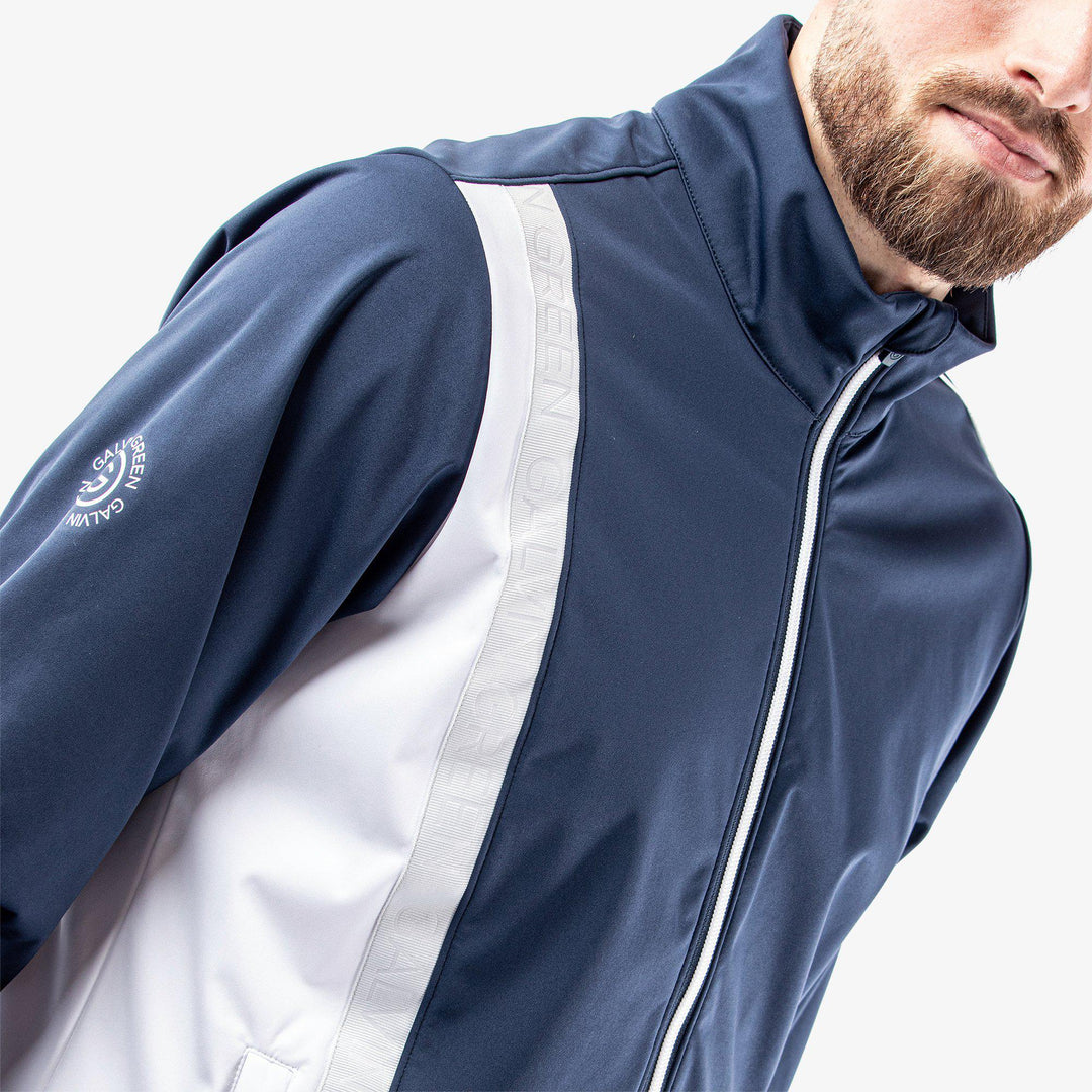 Lucien is a Windproof and water repellent jacket for  in the color Navy/White/Cool Grey(4)