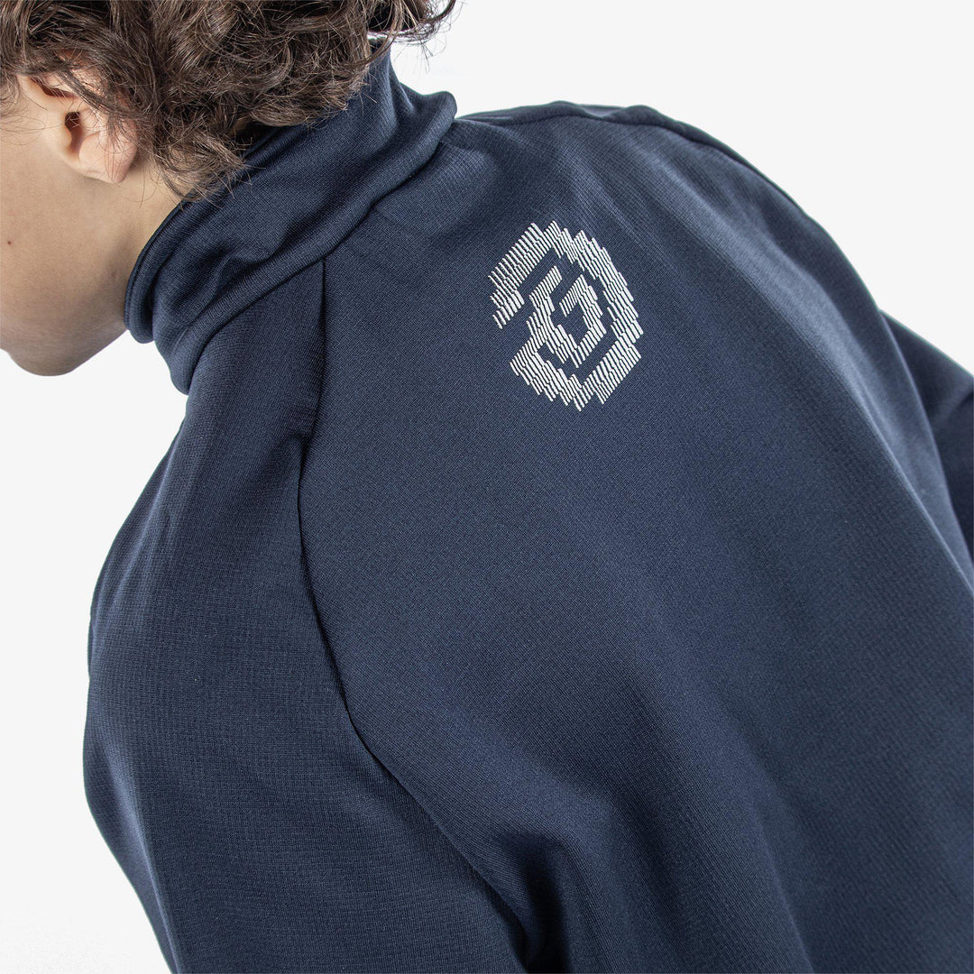 Raz is a Insulating golf mid layer for Juniors in the color Navy(6)