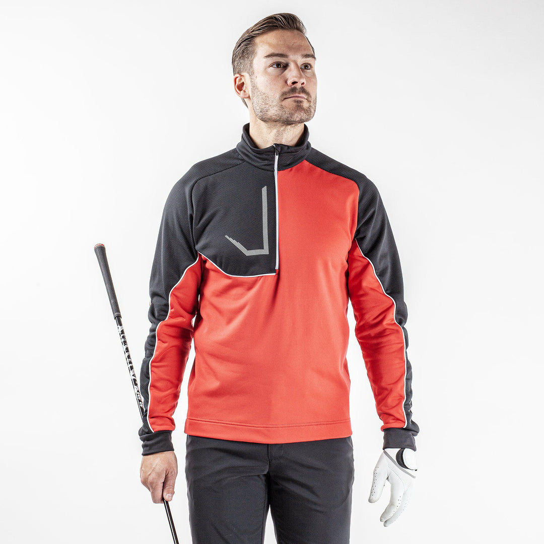 Daxton is a Insulating golf mid layer for Men in the color Red(1)