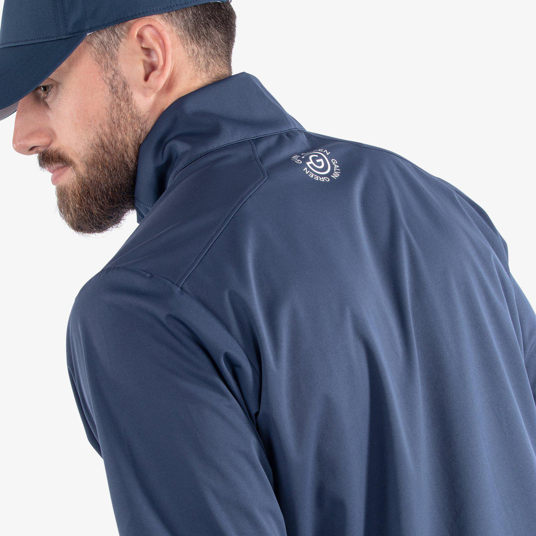Livingston is a Windproof and water repellent golf jacket for Men in the color Aqua/Navy(5)