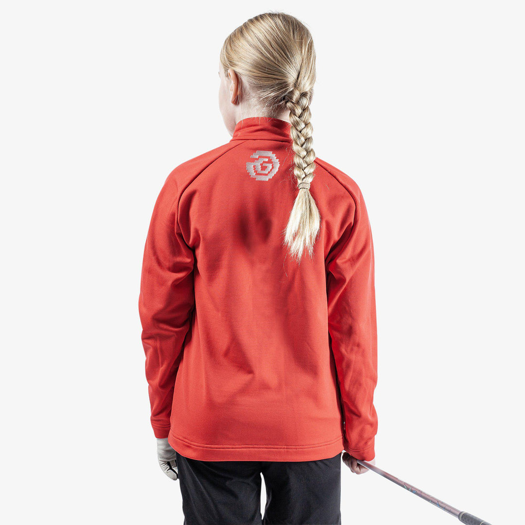 Raz is a Insulating golf mid layer for Juniors in the color Red(5)