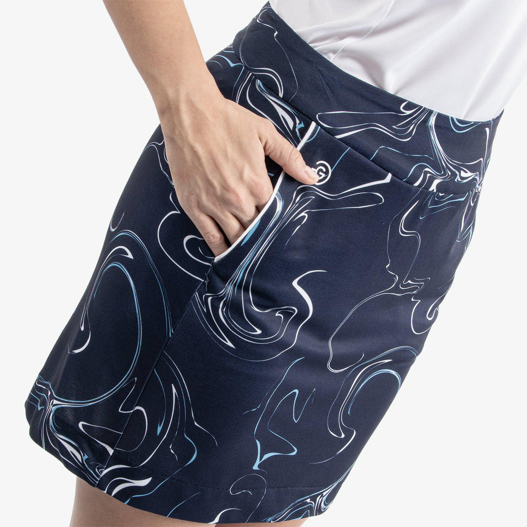 Mabel is a Breathable golf skirt with inner shorts for Women in the color Navy/White/Blue Bell(4)