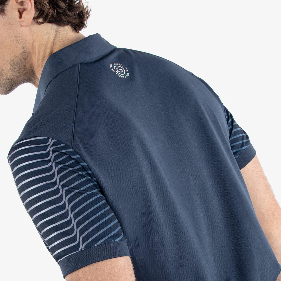 Milion is a Breathable short sleeve golf shirt for Men in the color Navy/White(6)