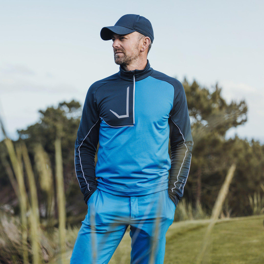 Daxton is a Insulating golf mid layer for Men in the color Blue/Navy/White(8)