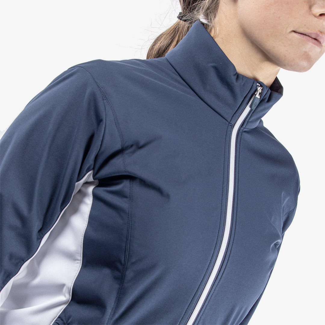 Larissa is a Windproof and water repellent golf jacket for Women in the color Navy/White(4)