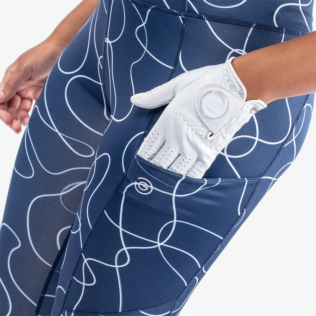 Nicoline is a Breathable and stretchy golf leggings for Women in the color Navy/White(4)