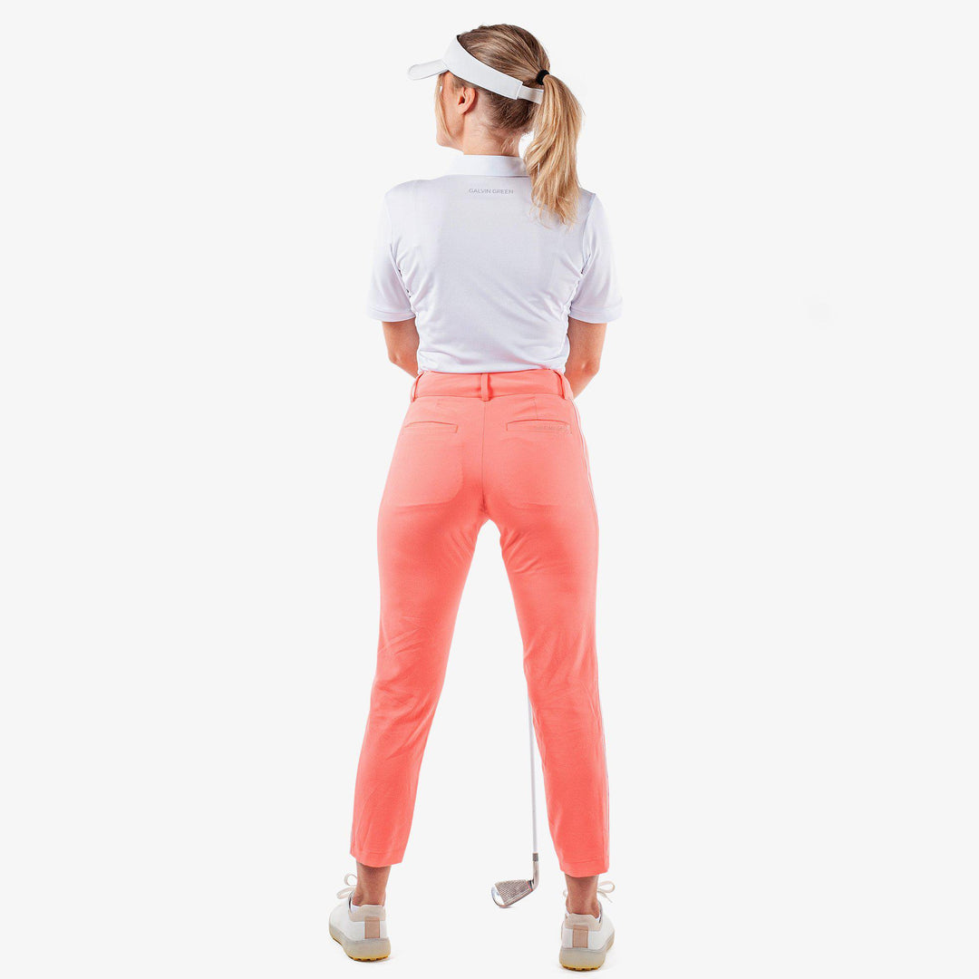 Nicole is a Breathable golf pants for Women in the color Coral/White (6)