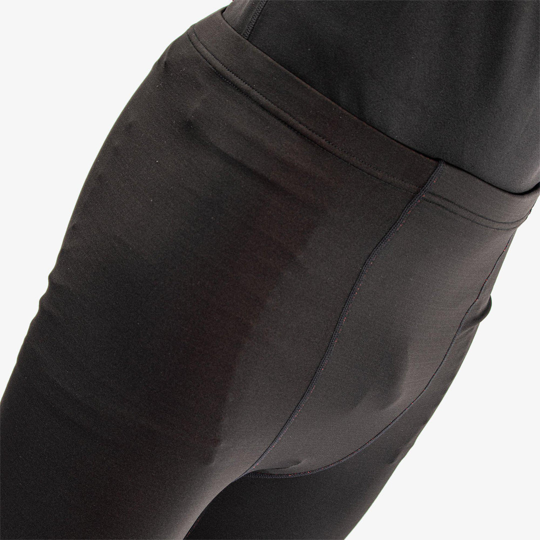 Elof is a Thermal base layer golf leggings for Men in the color Black/Red(3)