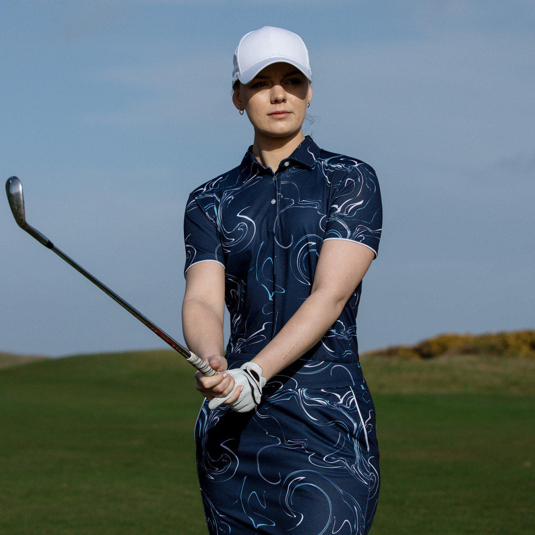 Malena is a Breathable short sleeve golf shirt for Women in the color Navy/White/Blue Bell(10)
