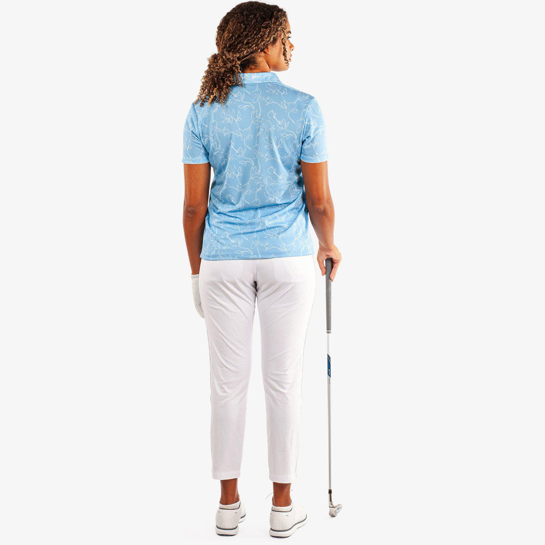 Mallory is a Breathable short sleeve golf shirt for Women in the color Alaskan Blue/White(6)