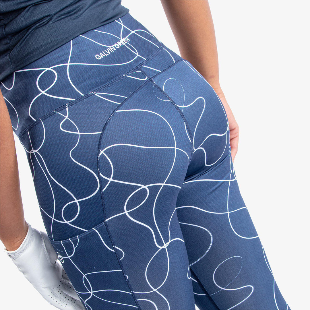 Nicoline is a Breathable and stretchy golf leggings for Women in the color Navy/White(5)