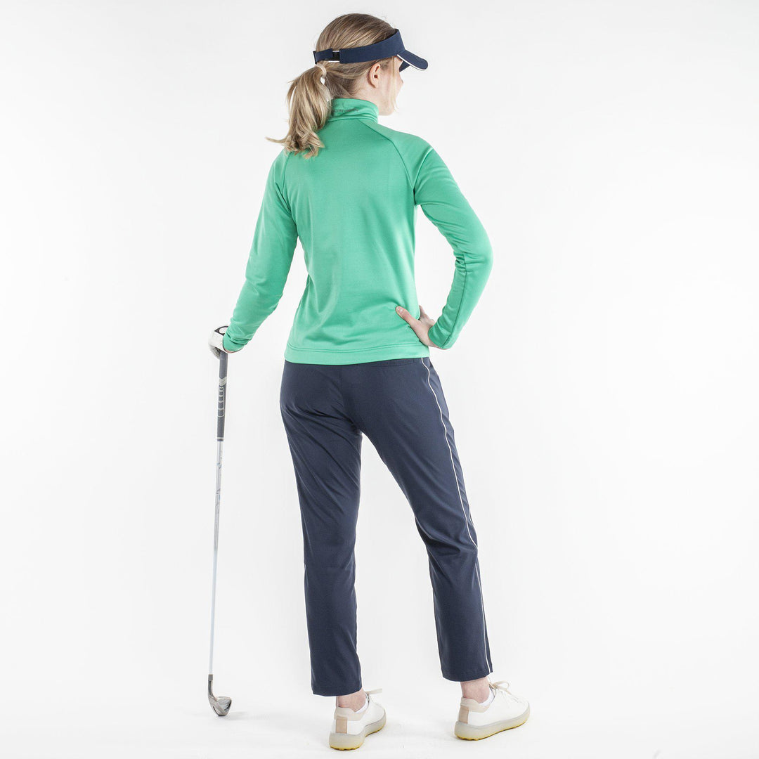 Dolly is a Insulating golf mid layer for Women in the color Holly Green(6)