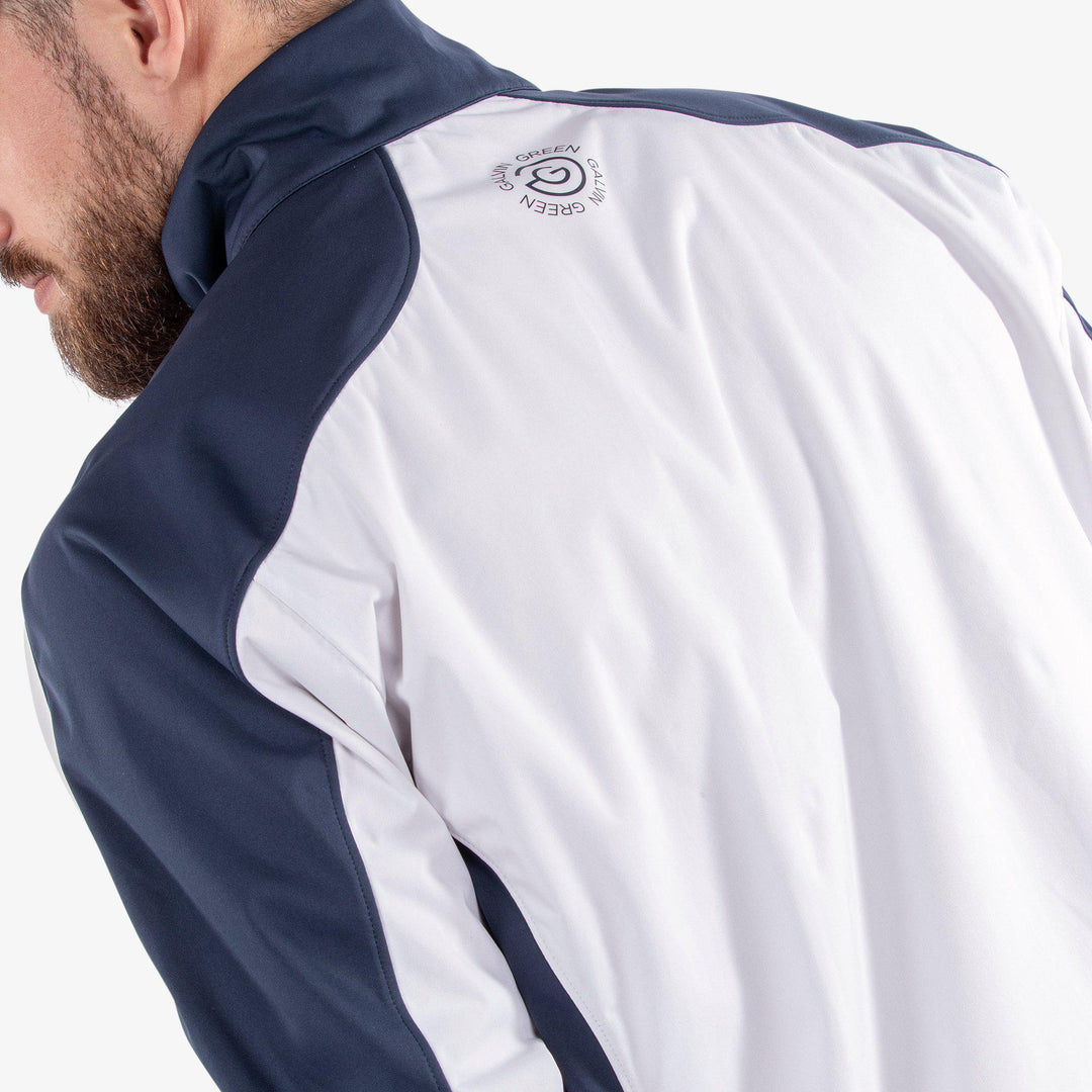 Lawrence is a Windproof and water repellent golf jacket for Men in the color White/Navy(5)